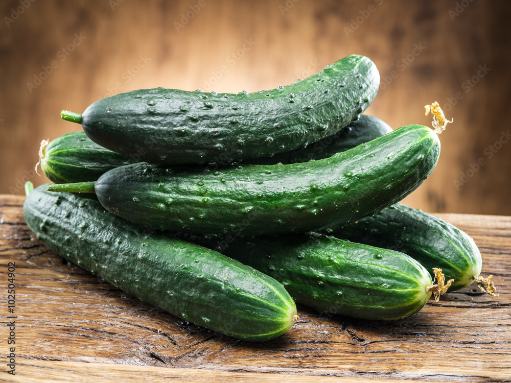 Cucumbers on the wooden table. Cucumbers on the wooden table.