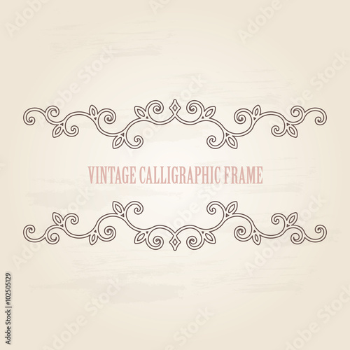 Vintage calligraphic frame on old paper background.