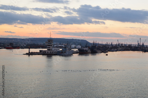Varna harbor with cargo docks after sunset