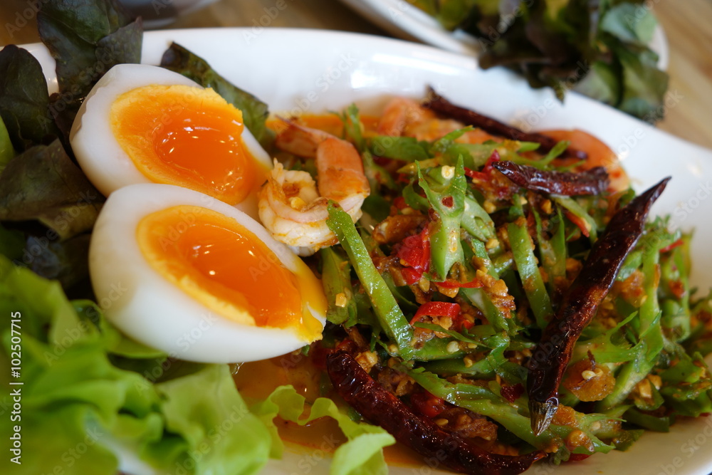 Winged bean spicy salad with boiled egg and shrimp Winged bean spicy salad with boiled egg and shrimp