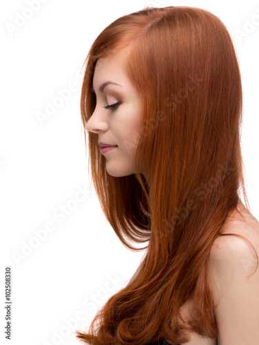 Beautiful young red-haired girl
