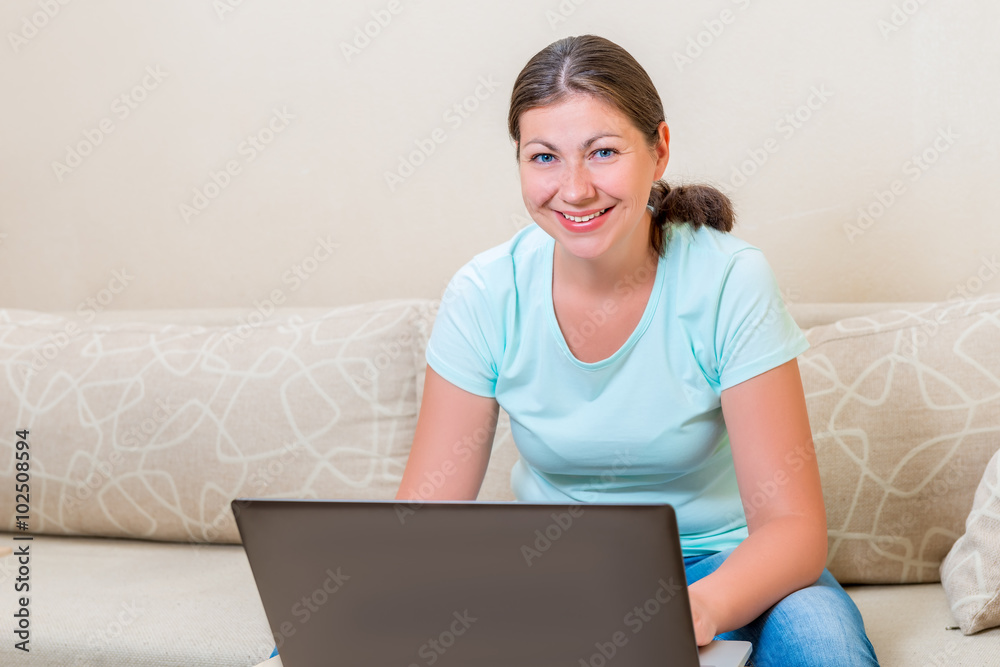 portrait of a girl of European appearance with a laptop in the l portrait of a girl of European appearance with a laptop in the l
