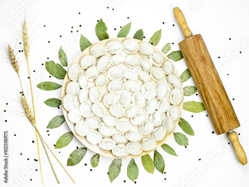 Russian pelmeni dumplings on a plate. Top view