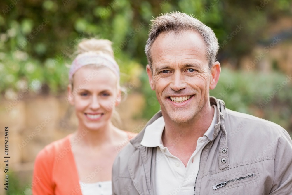 Cute couple smiling at camera