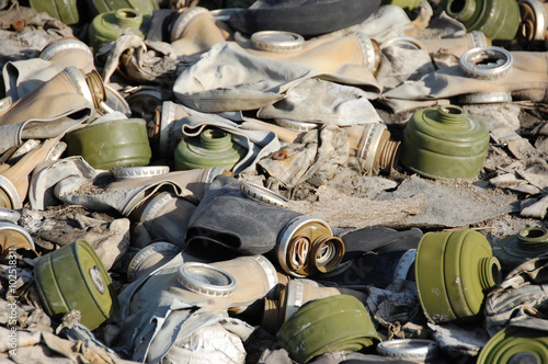 Old broken abandoned respirators at ground photo