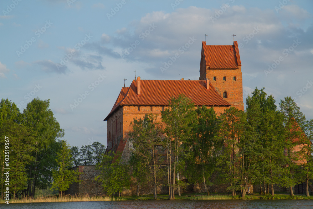 Old medieval castle on lake island.