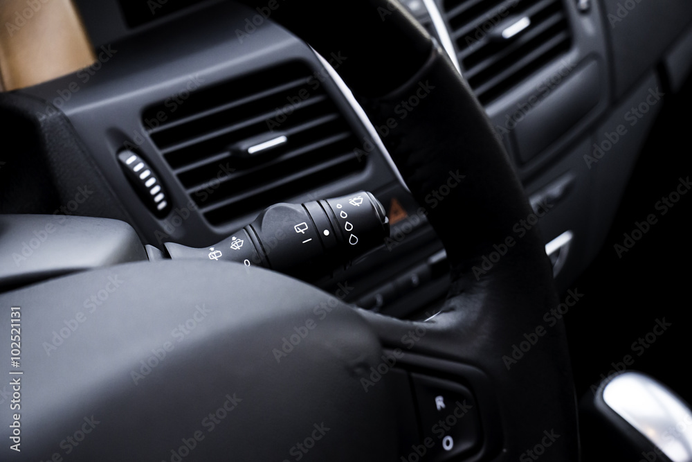 Car wiper control. Close up shot of car interior.