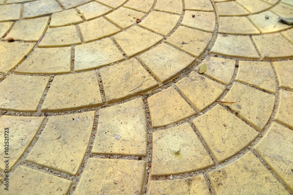 Modern yellow paving slabs laid out spherically Modern yellow paving slabs laid out spherically