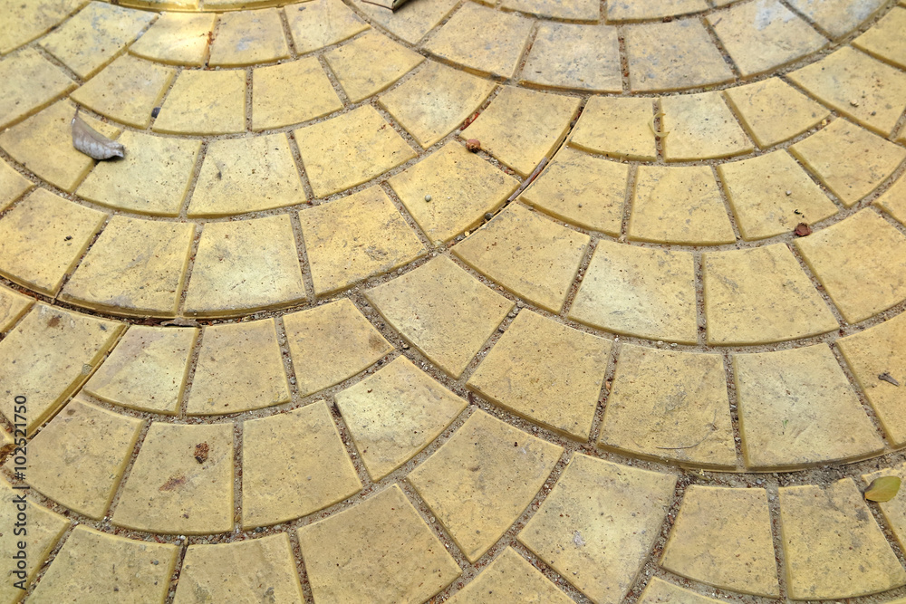 Modern yellow paving slabs laid out spherically Modern yellow paving slabs laid out spherically