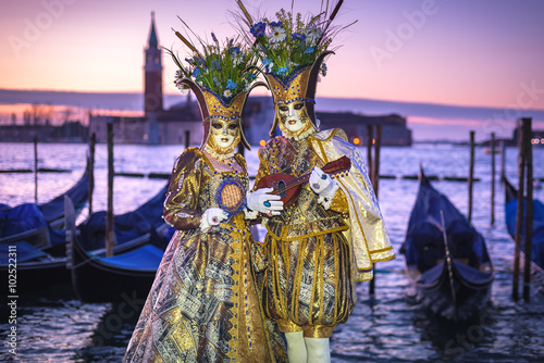 Costumed couple on the San Marco square during Carnival in Venic © Jarek Pawlak