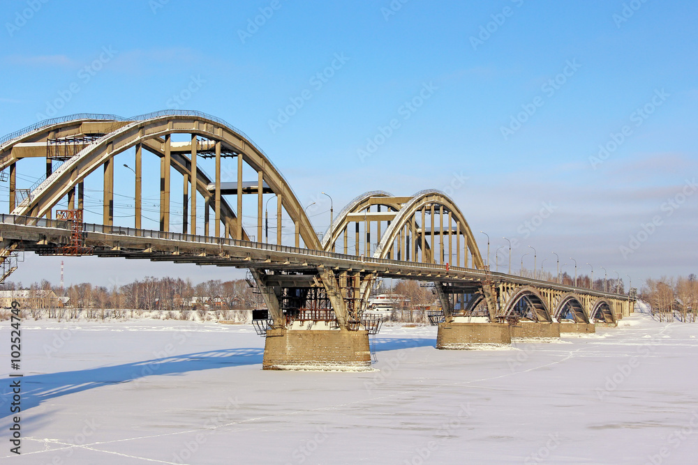 Fototapeta premium The bridge through the Volga River, Rybinsk.