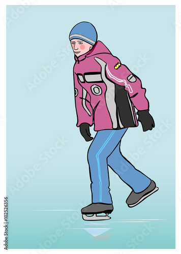 Boy ice skating in winter at the rink .