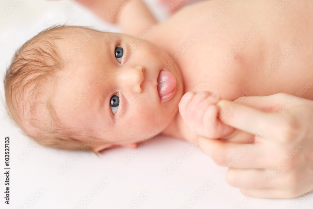 One month old newborn baby with mother One month old newborn baby with mother