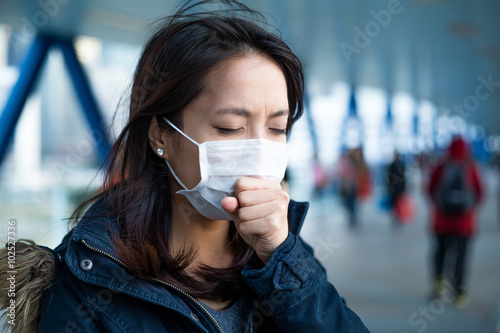 Asian Woman feeling unwell at outdoor