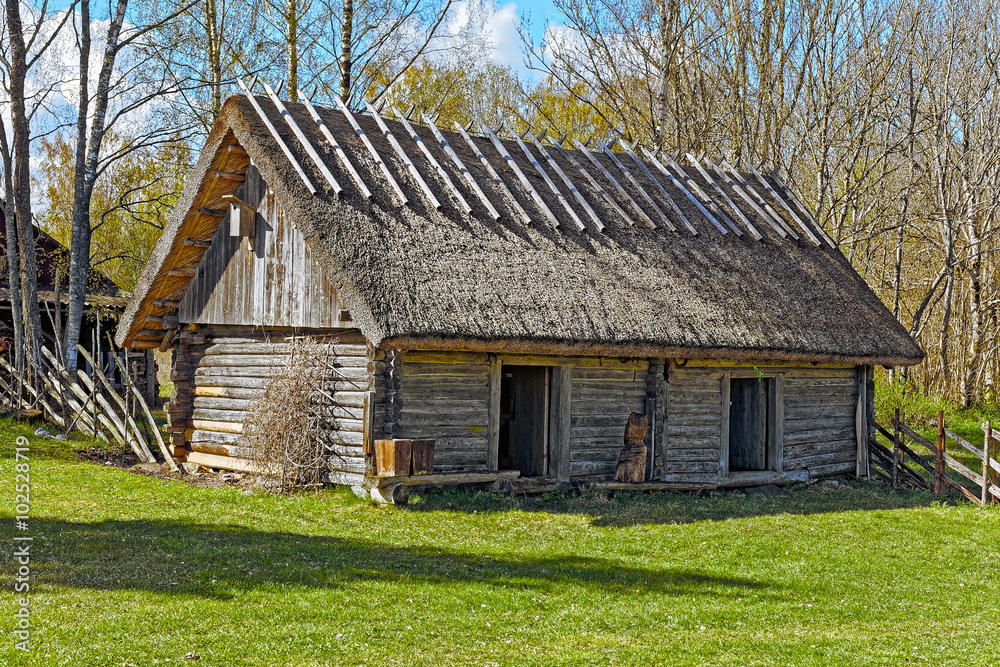 Old barn with thatch and two doors Old barn with thatch and two doors
