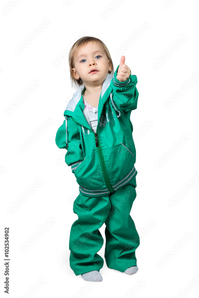 Child in sports suit raised thumb up Child in sports suit raised thumb up