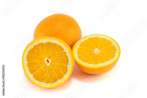 halved and whole orange isolated