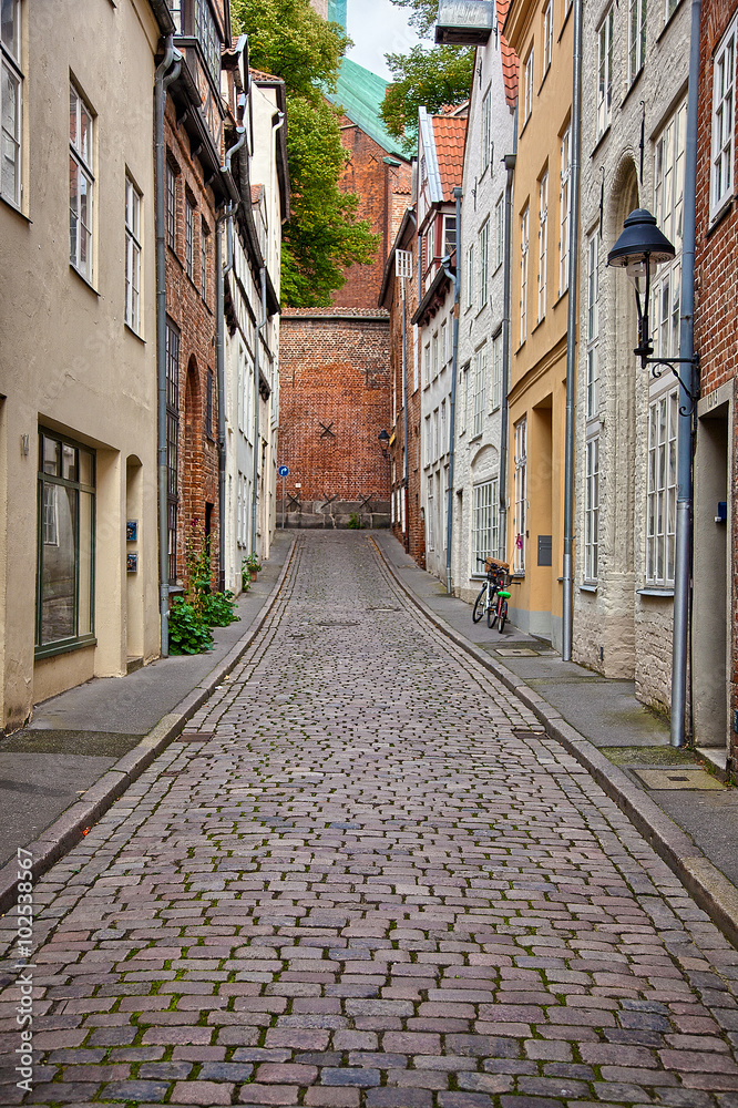 Fototapeta premium Urban scene in the historic old town of Lubeck, Germany