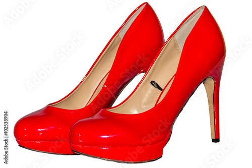 Red varnished shoes high heel isolated white background