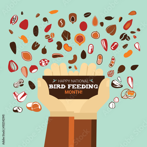 Hands holding a card with the text on National Bird Feeding Month