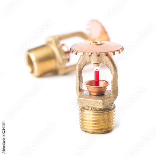 Obraz na plátne Upright regular sprinkler head with flat spray sprinkler on the background