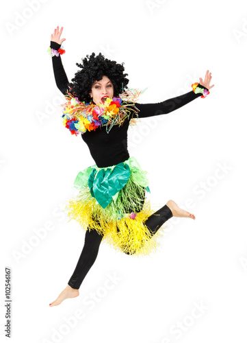 Funny aborigine girl in native costume jumping isolated