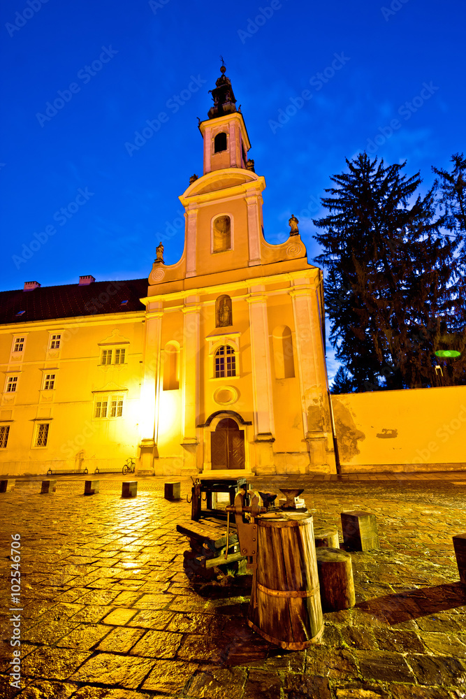 Varazdin old street and church evening view