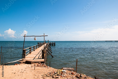 City Rameswaram, Tamil Nadu, South India. Bay of Bengal, the wooden pier for boats photo