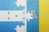 puzzle with the national flag of canary islands and honduras