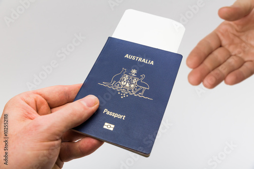 Handing over passport at border control