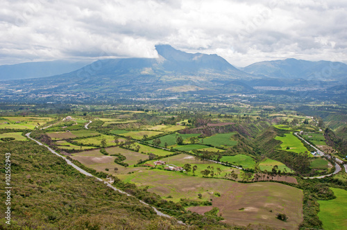 High view of the Imbabura volcano and countryside, from the trail that goes around the Cuicocha lake and volcano crater, Ecuador, South America.