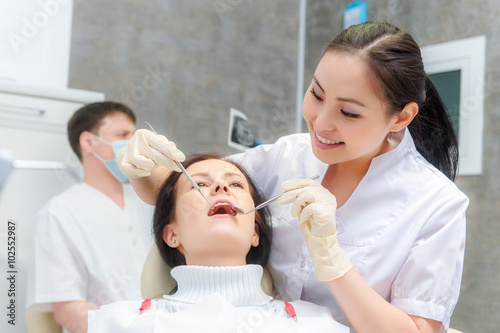Female patient with open mouth photo