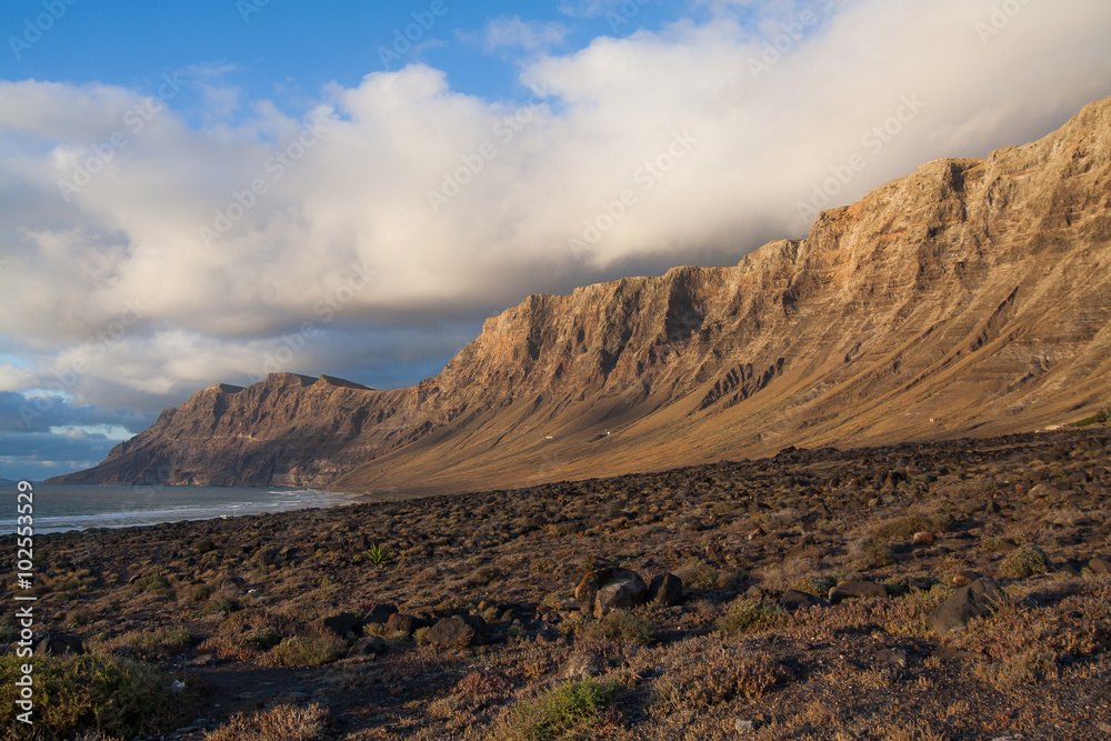 Mountain landscape on Lanzarote island in the Los Mariscales area at sunset