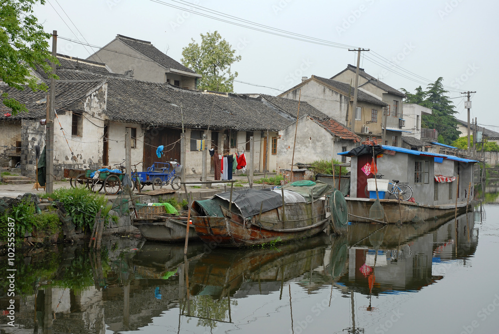Shanghai, floating houses on the canal at the Xitang ancient town, Shanghai, floating houses on the canal at the Xitang ancient town,