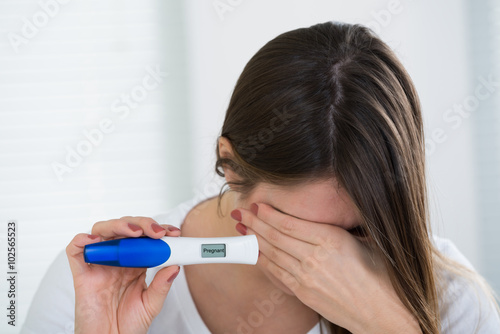 Woman Holding Pregnancy Kit