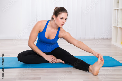 Woman Stretching Her Leg
