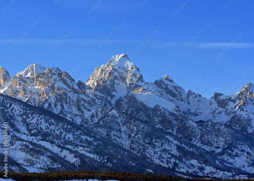 Buck Mountain (11, 938 ft) in the Grand Tetons range of the Central Rocky Mountains in Grand Tetons National Park in Bridger-Tetons National Forest in Wyoming USA during winter