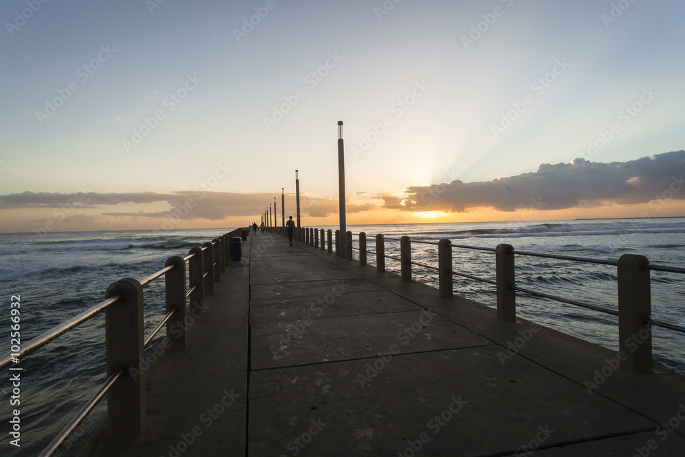 Beach Pier Ocean at sunrise