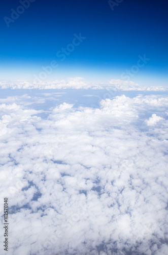 Fototapeta Naklejka Na Ścianę i Meble -  Blue sky background with tiny clouds