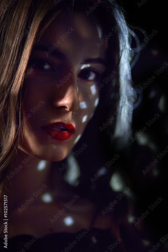 young woman with light