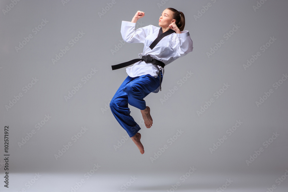 The karate girl with black belt The karate girl with black belt