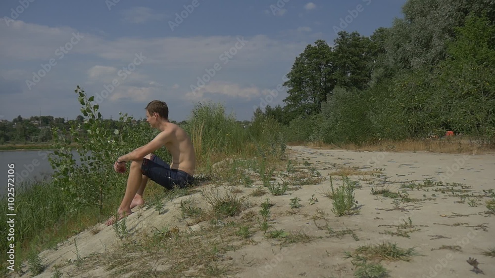 Young man on a beach Young man on a beach