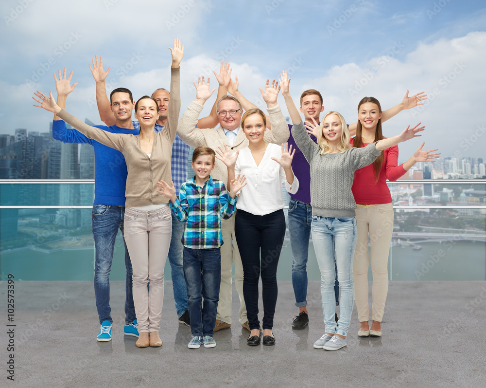 group of smiling people waving hands group of smiling people waving hands