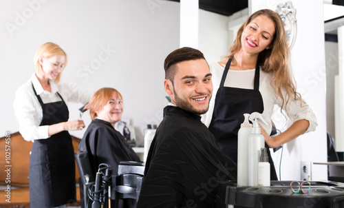 Happy man with new haircut photo