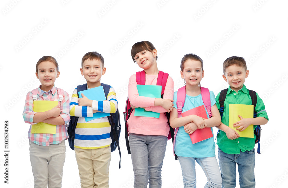 happy children with school bags and notebooks happy children with school bags and notebooks