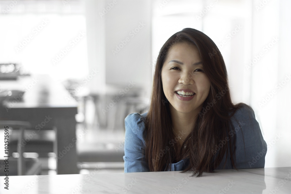 Asian female beautiful women portraits with smile, chinese girl relax life style in the cafe Asian female beautiful women portraits with smile, chinese girl relax life style in the cafe