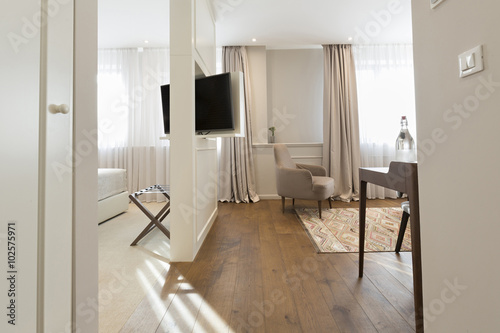 Hotel apartment interior with rotating mirror tv