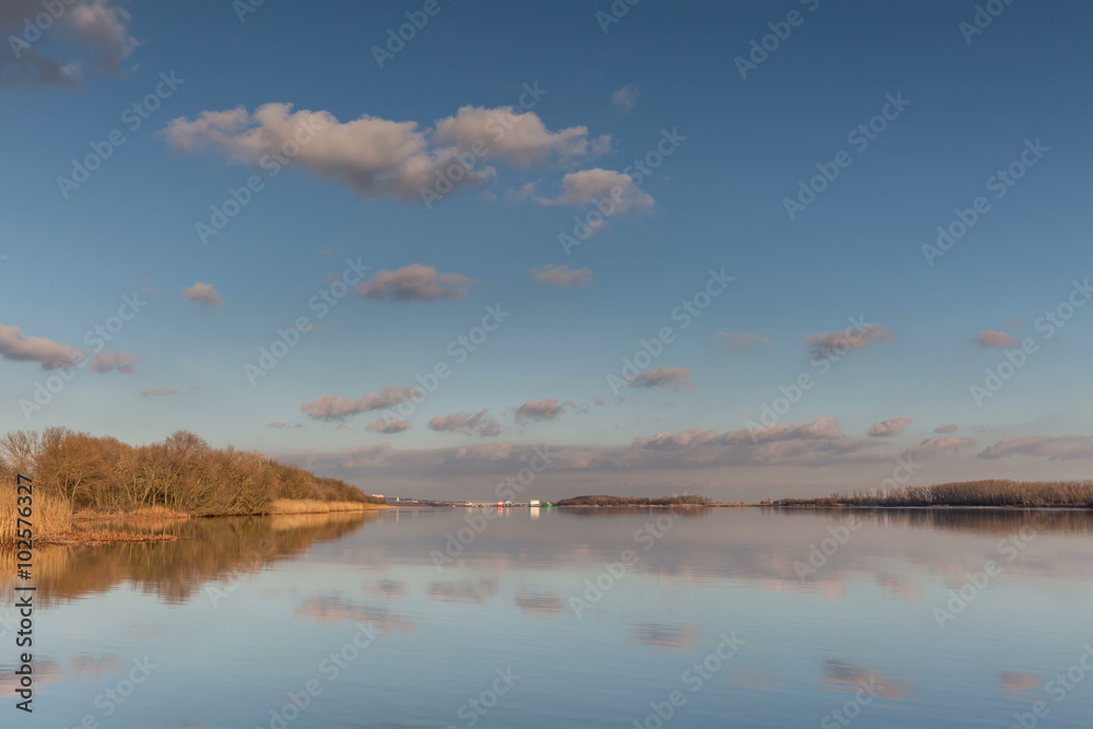 Time lapse. Russia, Rostov region. Moving clouds and their reflection in the river Don. Time lapse. Russia, Rostov region. Moving clouds and their reflection in the river Don.