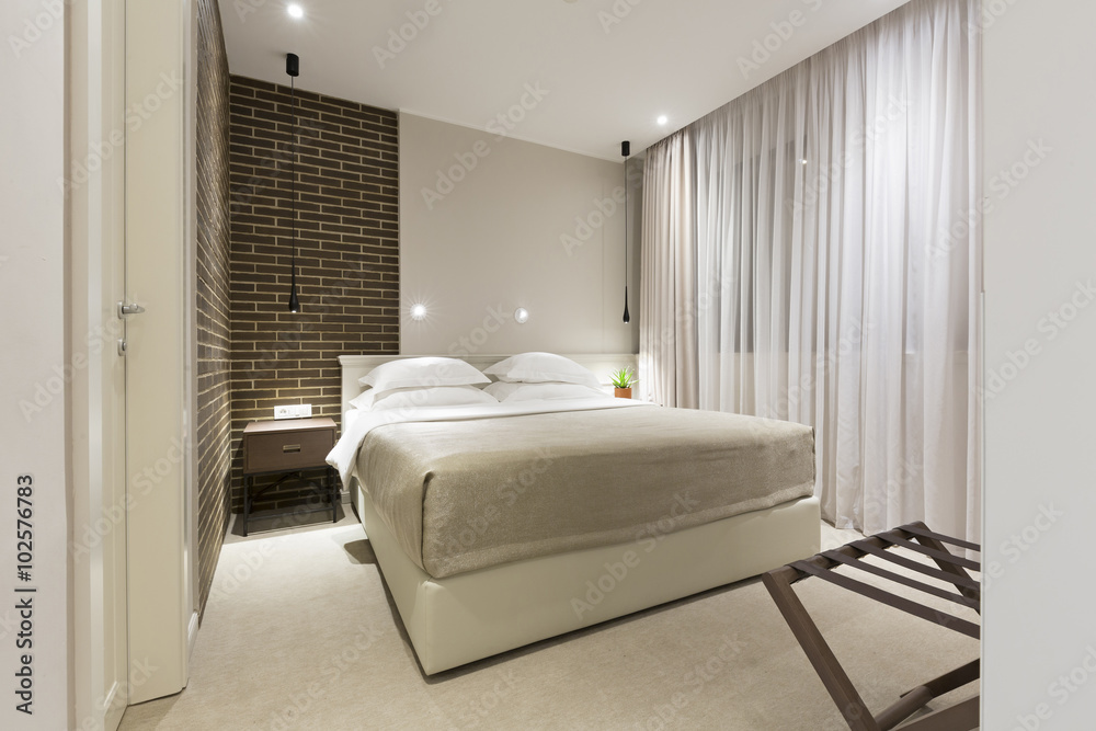 Fototapeta premium Modern bedroom interior in the evening