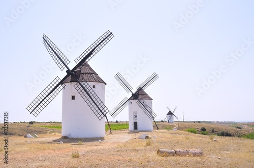 View on three windmills at field